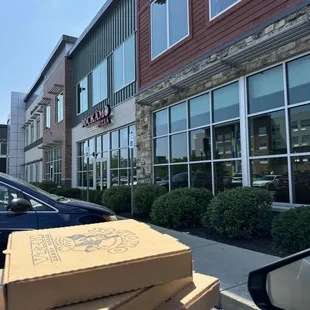 3 pizzas to go outside entry.