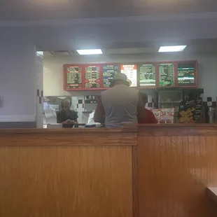 a man sitting at the counter