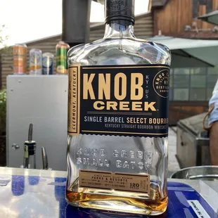 a bottle of knob creek single barrel select bourbon