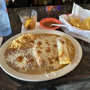 Burrito Chile Relleno ,Enchiladas ,rice and Beans.
