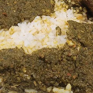 Cassava leaves...wish there was some over all of my rice.