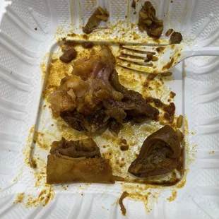 Curried goat skin, fat and gristle.