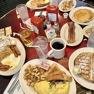 a table full of breakfast foods