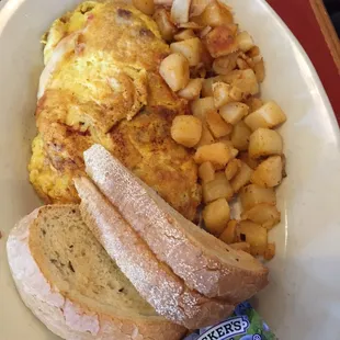Three egg Italian omelette with home fries and rye bread