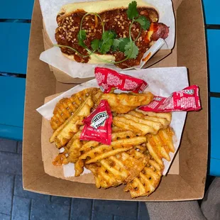 Kimchi dog and waffle fries
