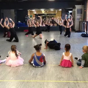 Sat. Stars class watching the older dancers. They open up rooms &amp; "share" in addition to having at least 2 parent watch weeks.