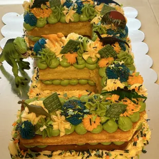 a dinosaur birthday cake