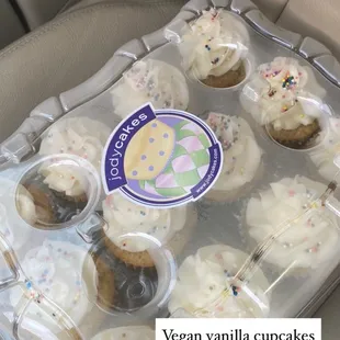 a tray of cupcakes in a car