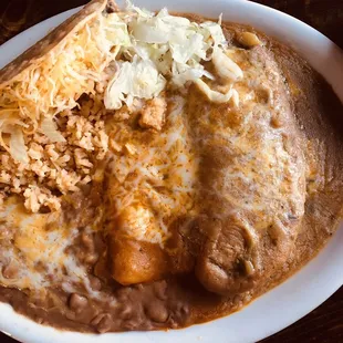 Taco, enchilada, chili reanello, rice and beans. Came with a tostada and dinner salad. SOOOOOO GOOD!!