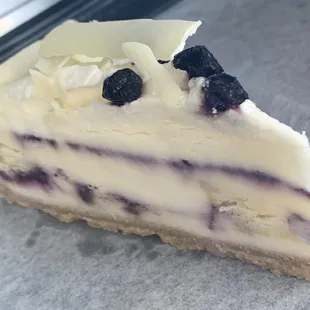 Blueberry cheesecake with white chocolate shavings
