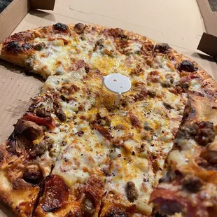 Meat lovers pizza with Artichoke and Pineapple and BBQ base