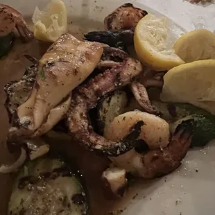 Grigliati. This is an appetizer we eat as a dinner, grilled calamari, shrimp, octopus, zucchini and eggplant. Delicious!!!