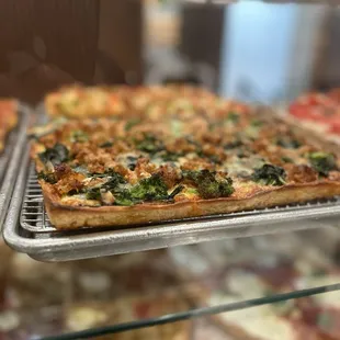 Crumble sausage over broccoli rabe square