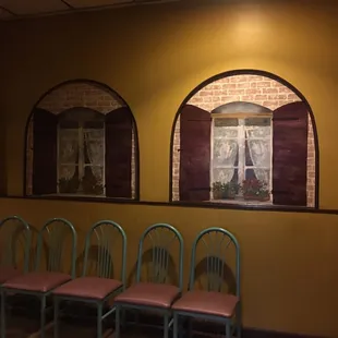 a row of chairs in a restaurant