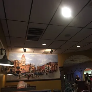 a mural of a town