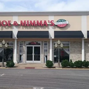 Our remodeled facade that the parcel owners finally updated with our new sign