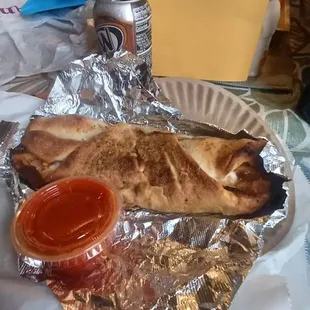 Soda Can and a  Chicken Roll