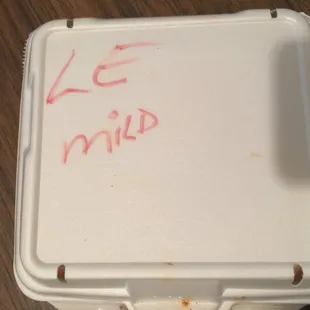 a piece of ice cream in a styrofoam container