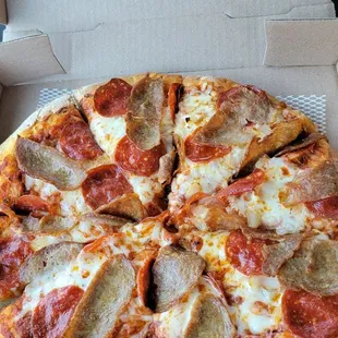 Sausage, pepperoni, and onion pizza