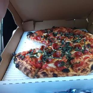 Pepperoni and basil pizza