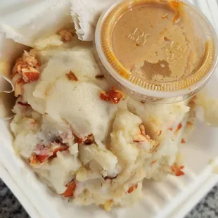 Lobster mashed potatoes was fabulous. And I dipped it in some type of cream sauce. Highly recommend!