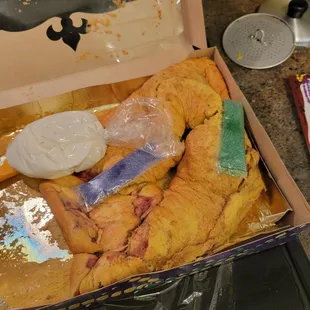 Mooshed cake. Arrived on its side. Shame on the company for not having handling instructions on the packaging!