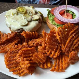 Cajun burger with sweet potato fries
