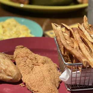 Catfish, chicken wing, french fries