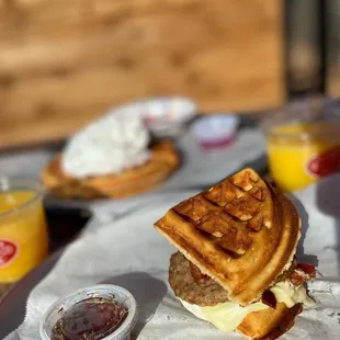 Bacon, Sausage, Egg, and cheese in a waffle sandwich!