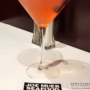 Black Orchid Specialty Cocktail - Effen raspberry vodka, St. Germain elderflower, white cranberryjuice, fresh lemon and blueberries