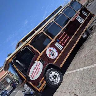 a tour bus parked in a parking lot