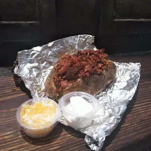 Seasonal Baked Potato topped with Brisket Chilli or other variety of meats