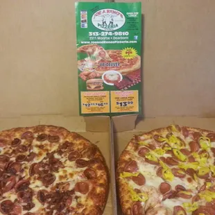 Pepperoni and bacon on the left, pepperoni and mild pepper rings on the right.  We just found our new favorite pizza place!
