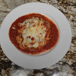 Meat Lasagna with melted mozzarella cheese on top. You can't go wrong.