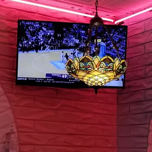 Beautiful stained glass chandeliers and several TV&apos;s throughout.