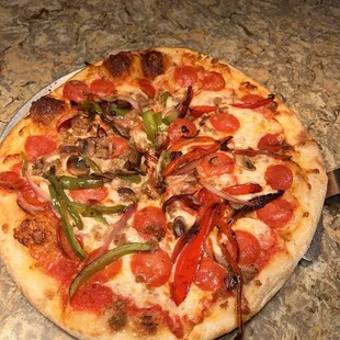 Medium Italian pizza, cooked perfectly, doesn't get any better