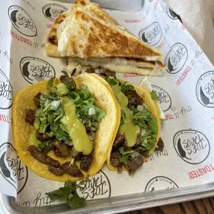 Carne Asada original tacos and quesadilla.