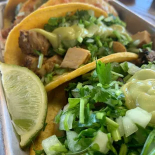 Regular chicken taco, asada toasted tacos and asada vampiro