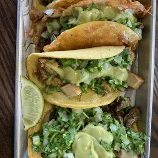 Regular chicken taco, asada toasted tacos and asada vampiro