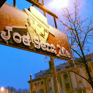 a street sign covered in snow