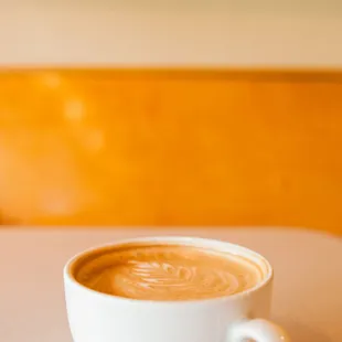 a cup of coffee on a table