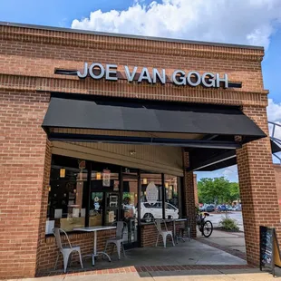 Outside Storefront and back patio. View from one of the two 15-minute pick-up spots on back side of Woodcroft Shopping Center.