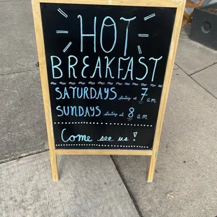 a sign for a hot breakfast