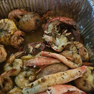 Seafood platter (Shrimp, potatoes, corn, snow crab cluster meat (was 2 clusters), lobster tail (they cut in half), corn ,&amp; sausage