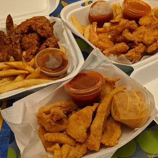 Fish Strips with Cajun Tartar Sauce, Foxy Emma and Mae Frencis (fried shrimp and fries), Big Boy Bird (BBQ wings)