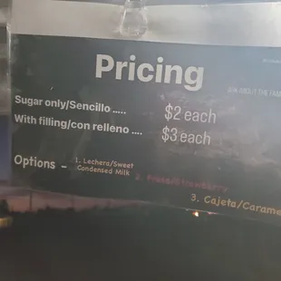 pricing sign for a coffee shop