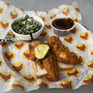 Two-piece chicken tenders with cherry wine barbecue sauce and kale salad