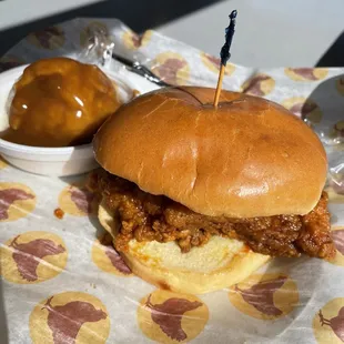 Chicken sandwich with a side of mashed potatoes &amp; gravy