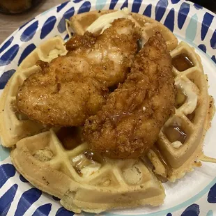 Waffles and tenders. I didn't get butter or my sauce. The spiked honey really completes this dish. Syrup just doesn't do it.