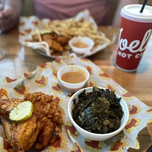 fried chicken, greens, and a side of sauces